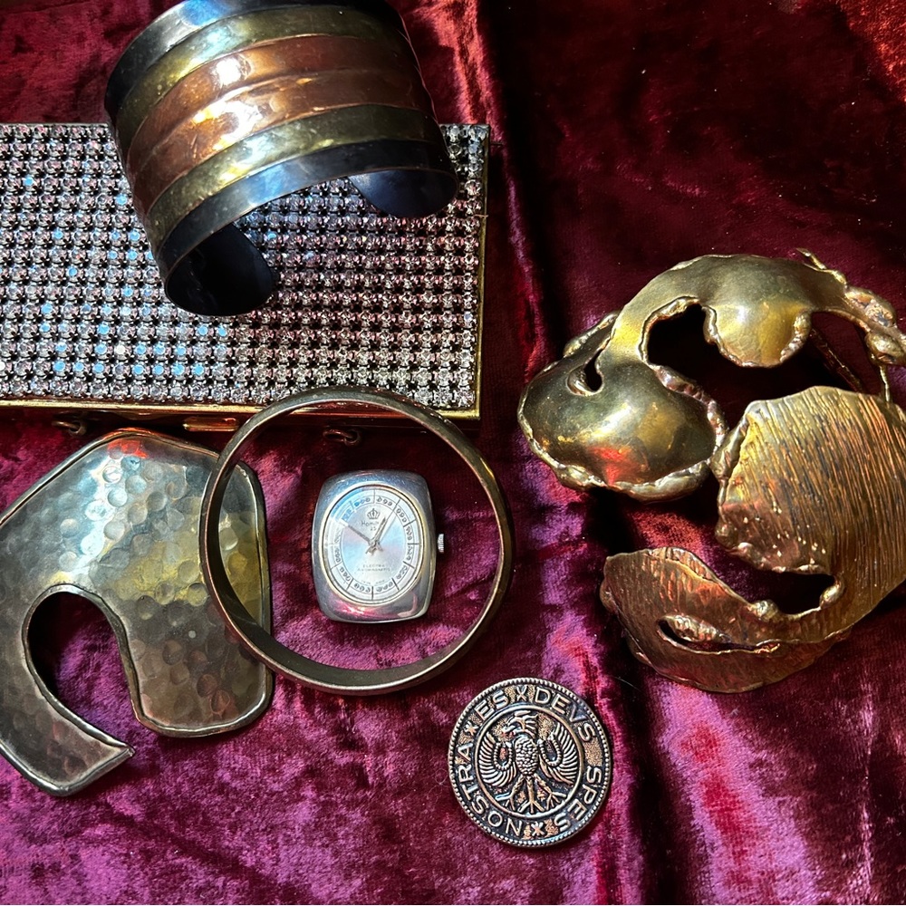 Brass in Pocket-Vintage bracelets (2), scarf (2), make up kit and more.